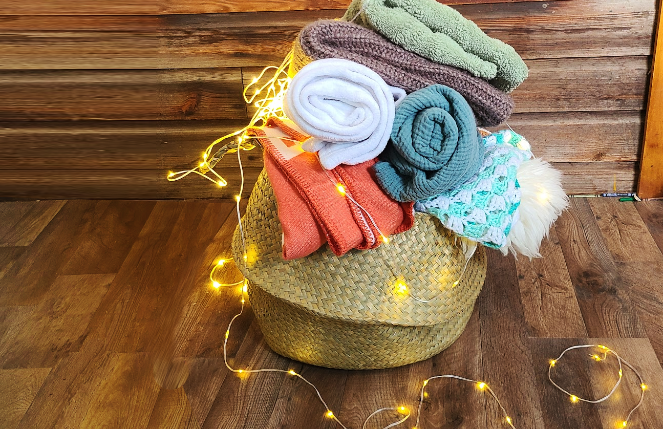a cute basket of cozy textiles